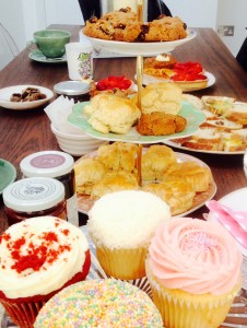 Afternoon tea with scones and cakes