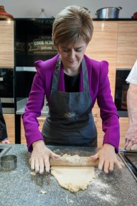 Nicola Sturgeon rolling the dough