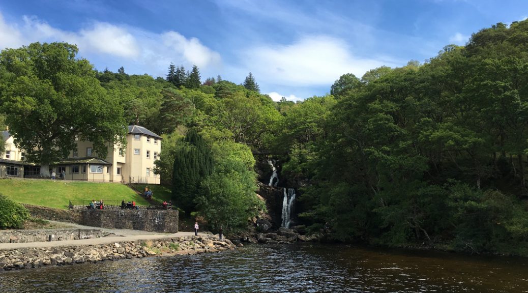 View from the loch of Invernaid Hotel with Arklet Falls to the right