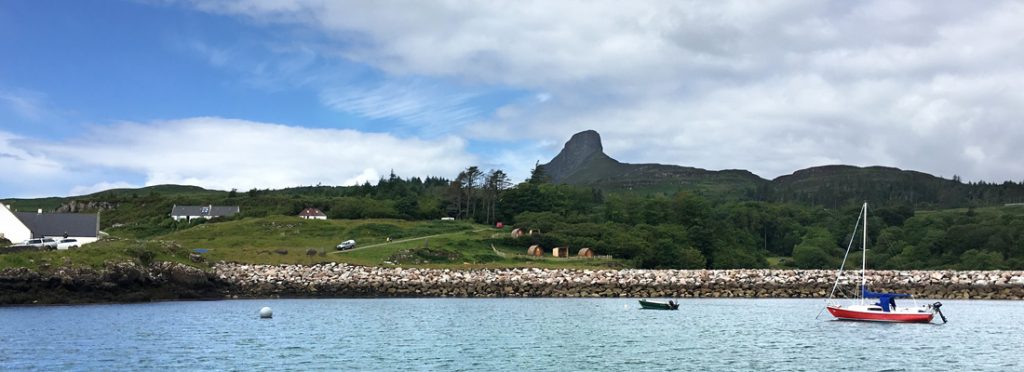 View of the Isle of Eigg from ferry arriving at Galmisdale