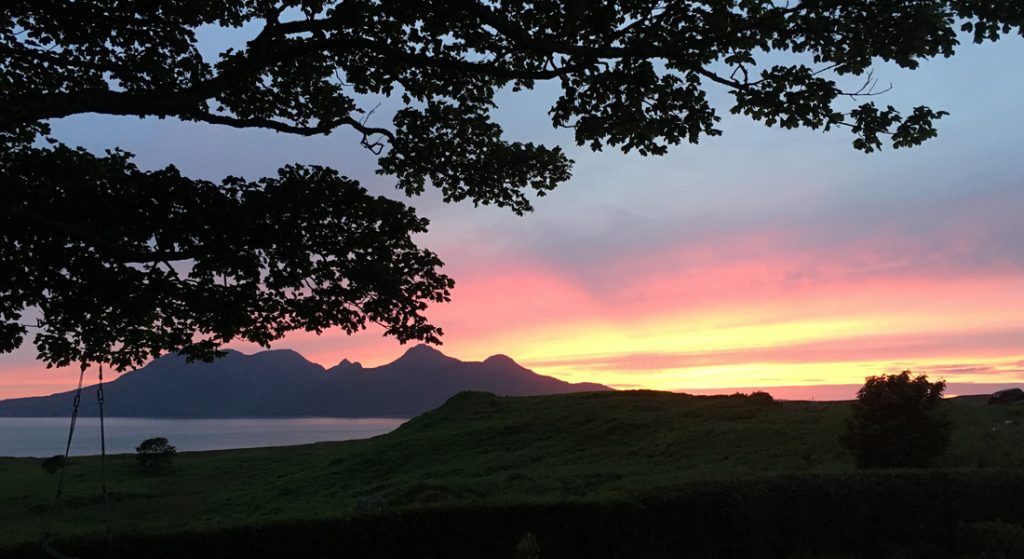 Sunset on the Isle of Eigg looking towards Rum