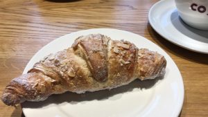 An almond croissant at Costa, Virginia Water