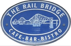 A sign for The Railbridge